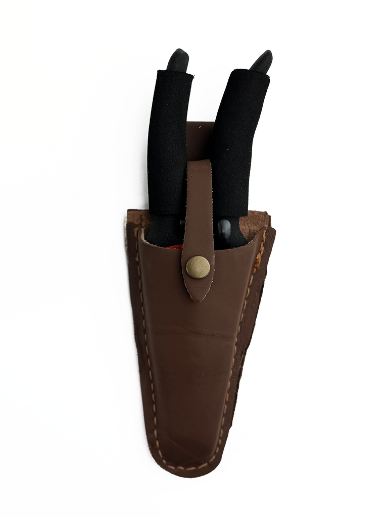 Close-up of the durable leather surface and fine stitching of the pruner sheath. The sheath offers rust protection, ensuring your gardening tools stay secure and ready for use.